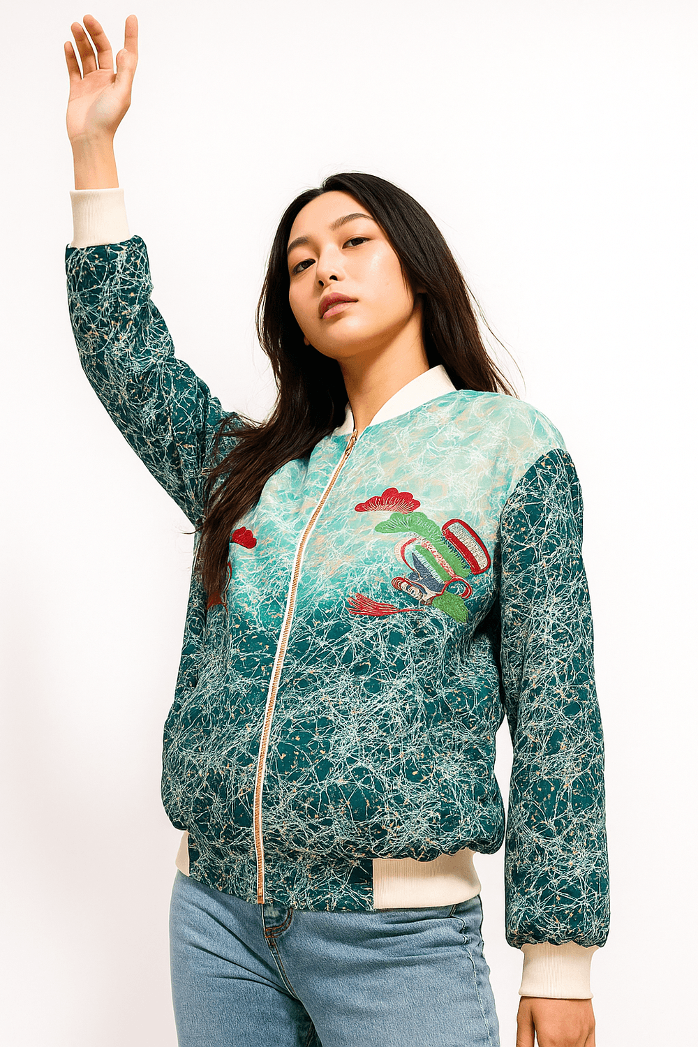Jaket bomber hijau tosca bermotif batik dengan sulaman bunga merah